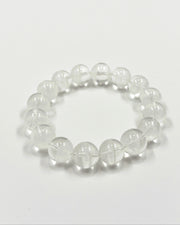 Clear beaded bracelet on a white background